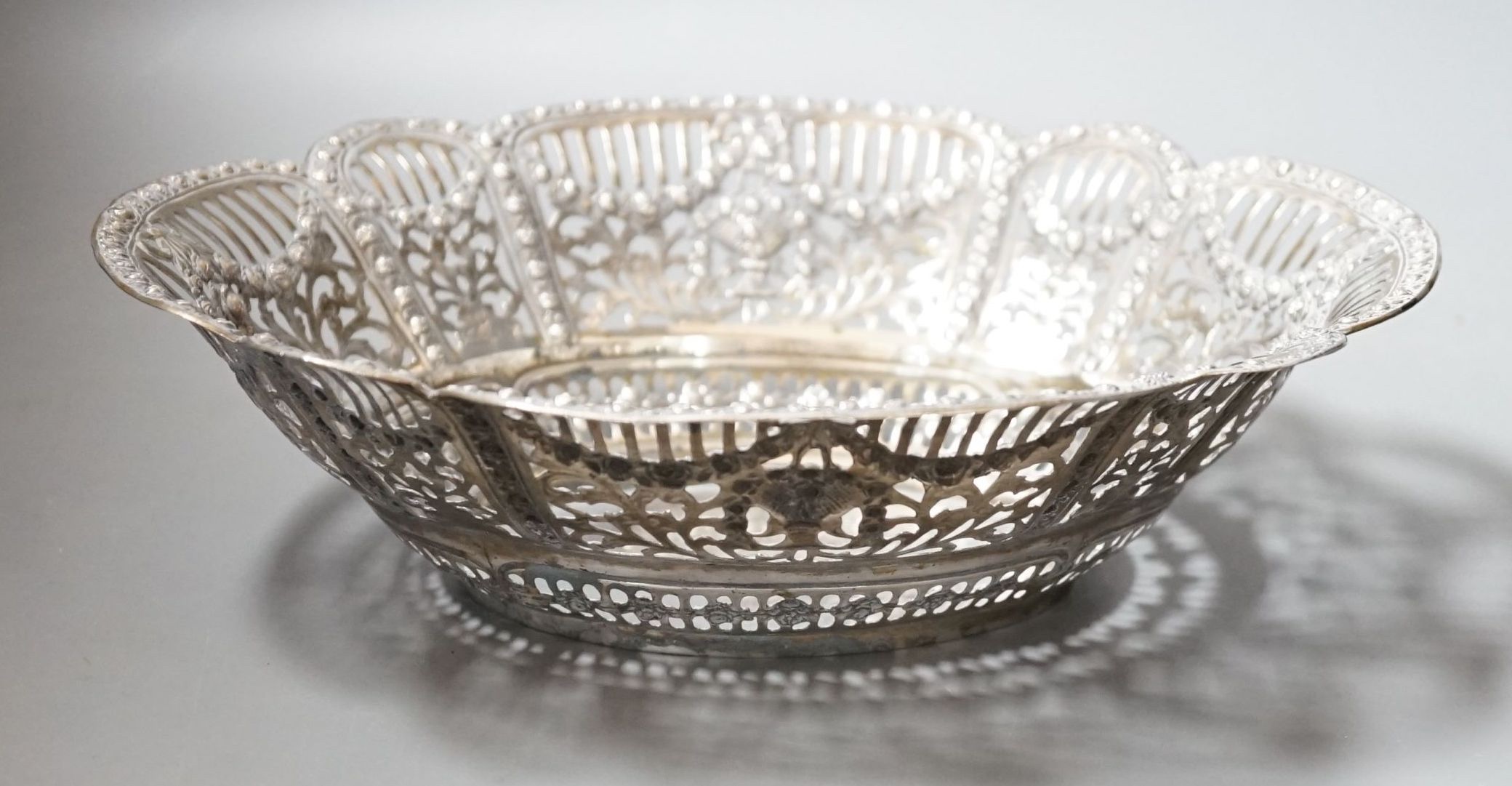 An early 20th century German 800 standard pierced white metal oval fruit bowl, 26.3cm, 10oz.